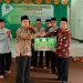 Penyerahan dana zakat untuk kegiatan di KUA Bulakamba