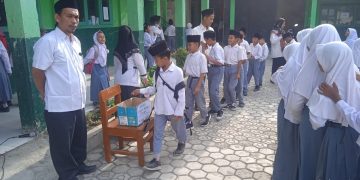 MI Sirojut Tholibin Berikan Sumbangan Donasi Gempa Cianjur